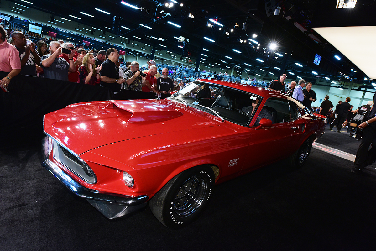 Barrett-Jackson on X: SCOTTSDALE AUCTION SPOTLIGHT: Finished in House of  Kolor Kandy Apple Red with a Mach 1 Brandywine stripe, this beautiful 1969  @FordMustang custom fastback is powered by a Boss 429