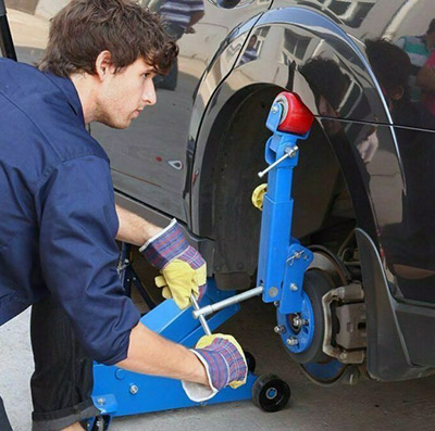 A fender roller gradually pushes out the fender