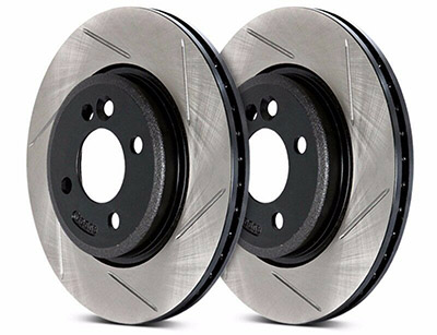 Brake rotor comparison: The slots in a rotor provide a way for gasses to escape.