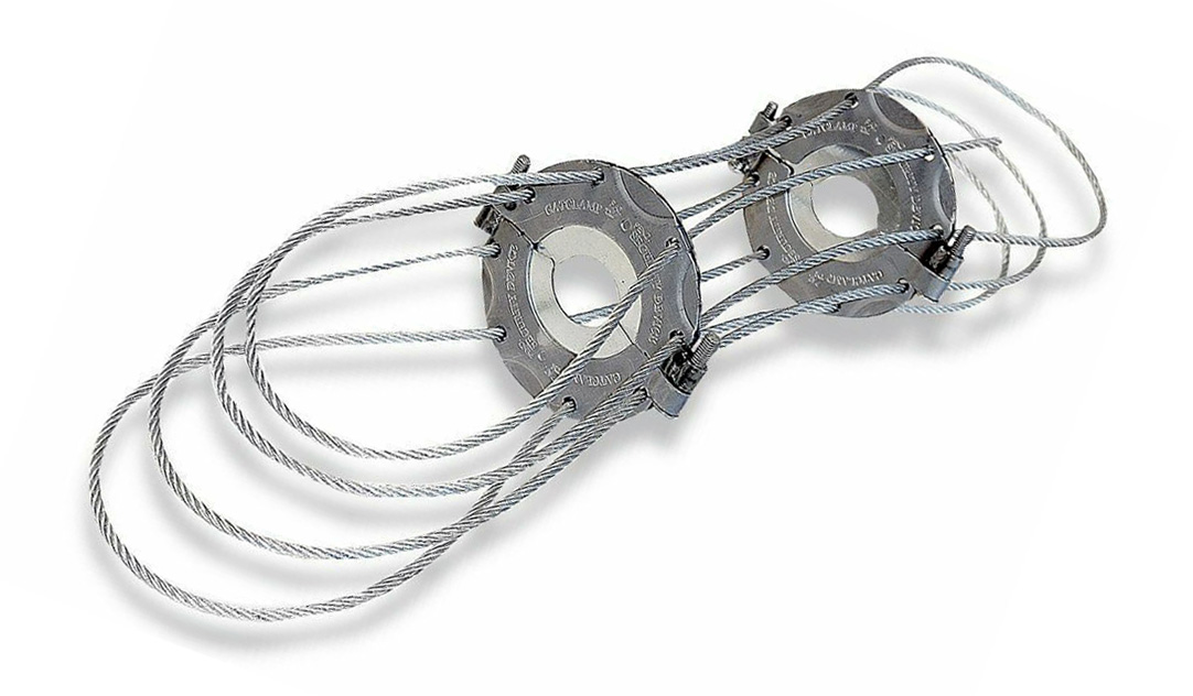 A cage (or lock) provides steel cables that wrap around the catalytic converter.