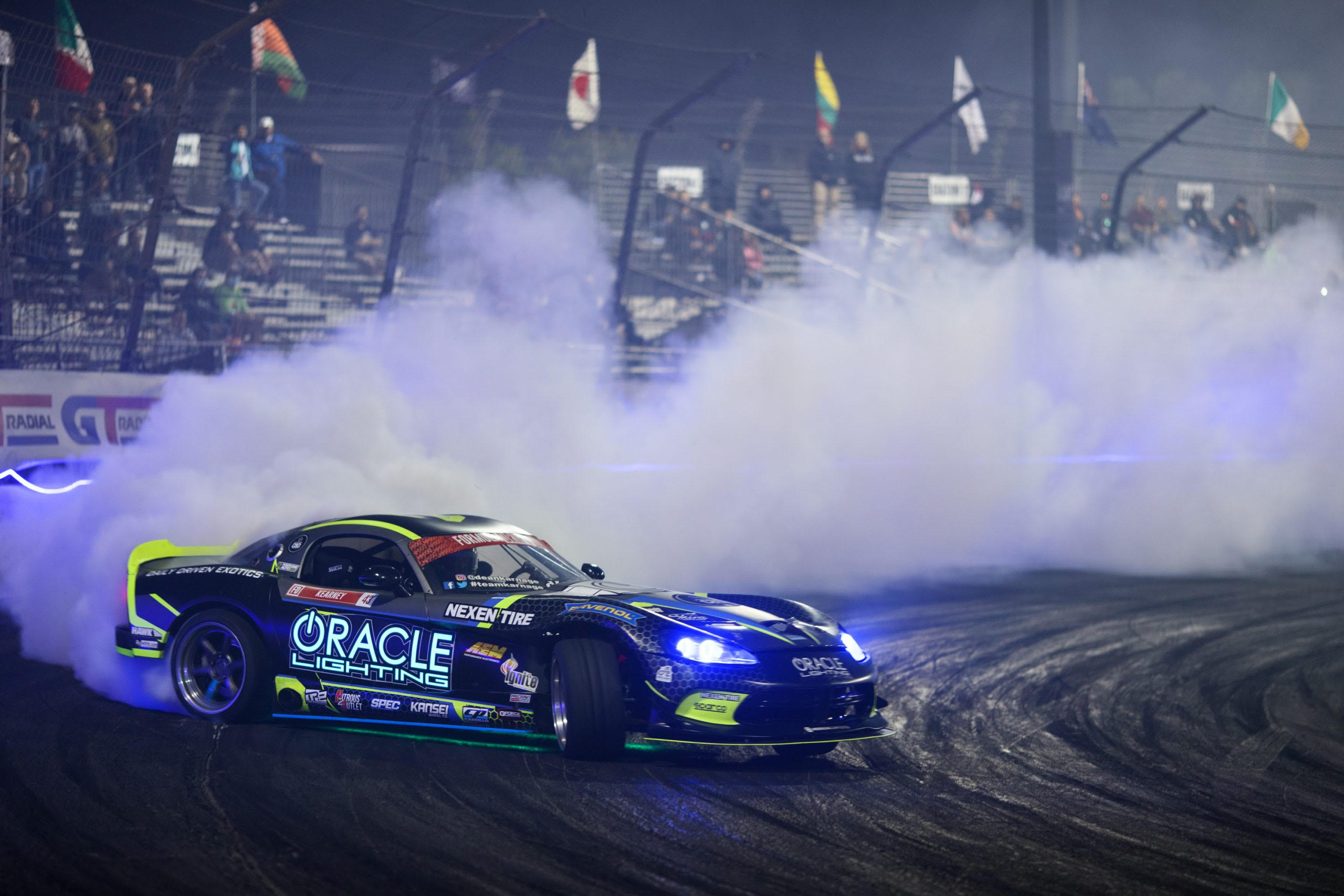 Dean Kearney's Oracle Lighting Dodge Viper drifting on a racetrack