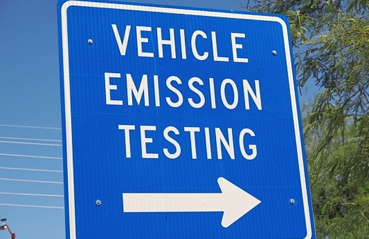 Vehicle emissions testing sign