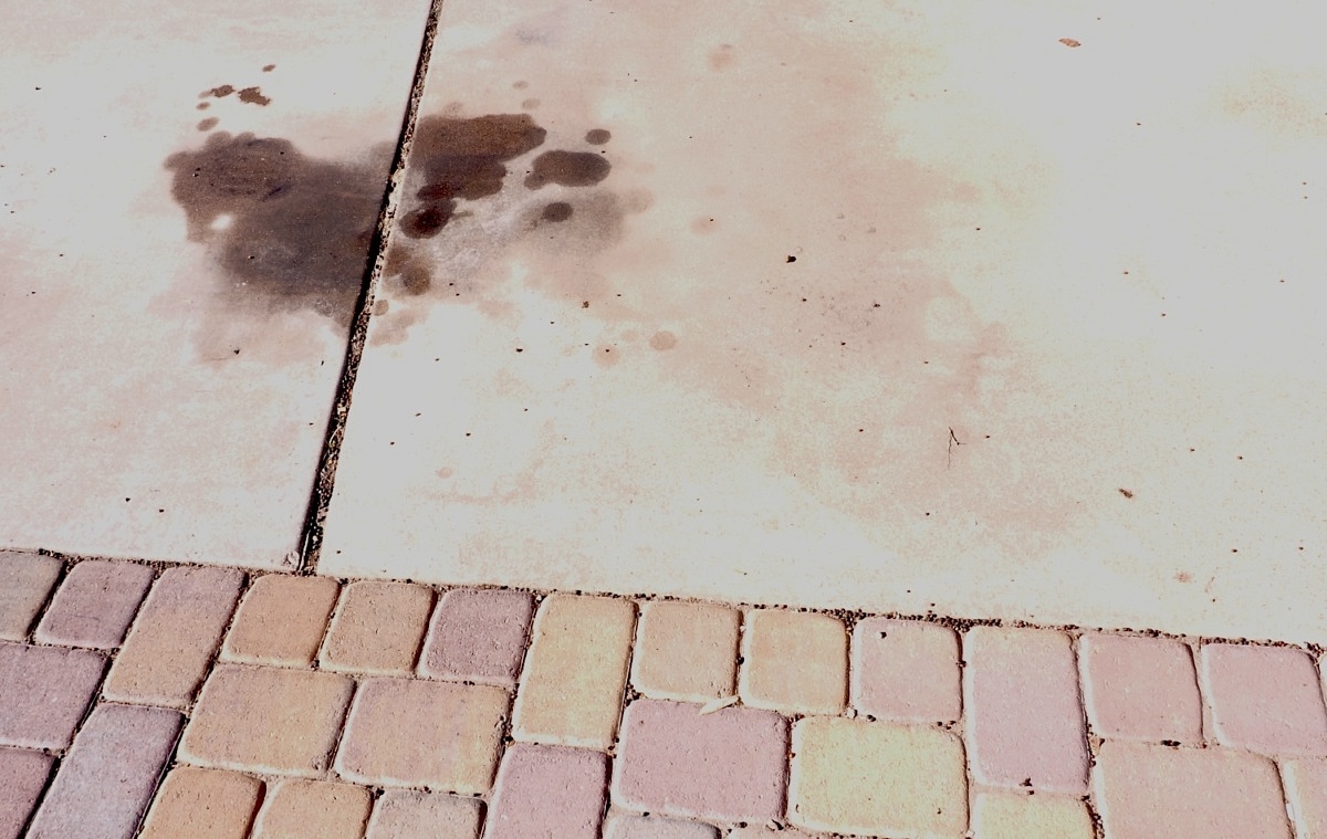 How To Remove Car Oil From A Driveway EBay Motors Blog   Oil On Concrete Driveway Paver Border 1200x759 