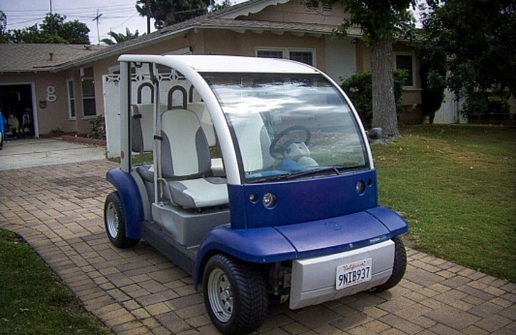 blue 2002 blue Think Neighbor golf cart - right front profile